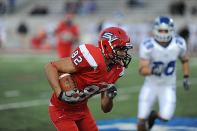 Cardinals Whallop Wildcats, 48-26