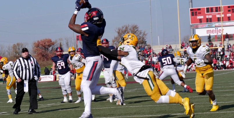 Cardinals power past Wildcats 33-21 on Senior Day