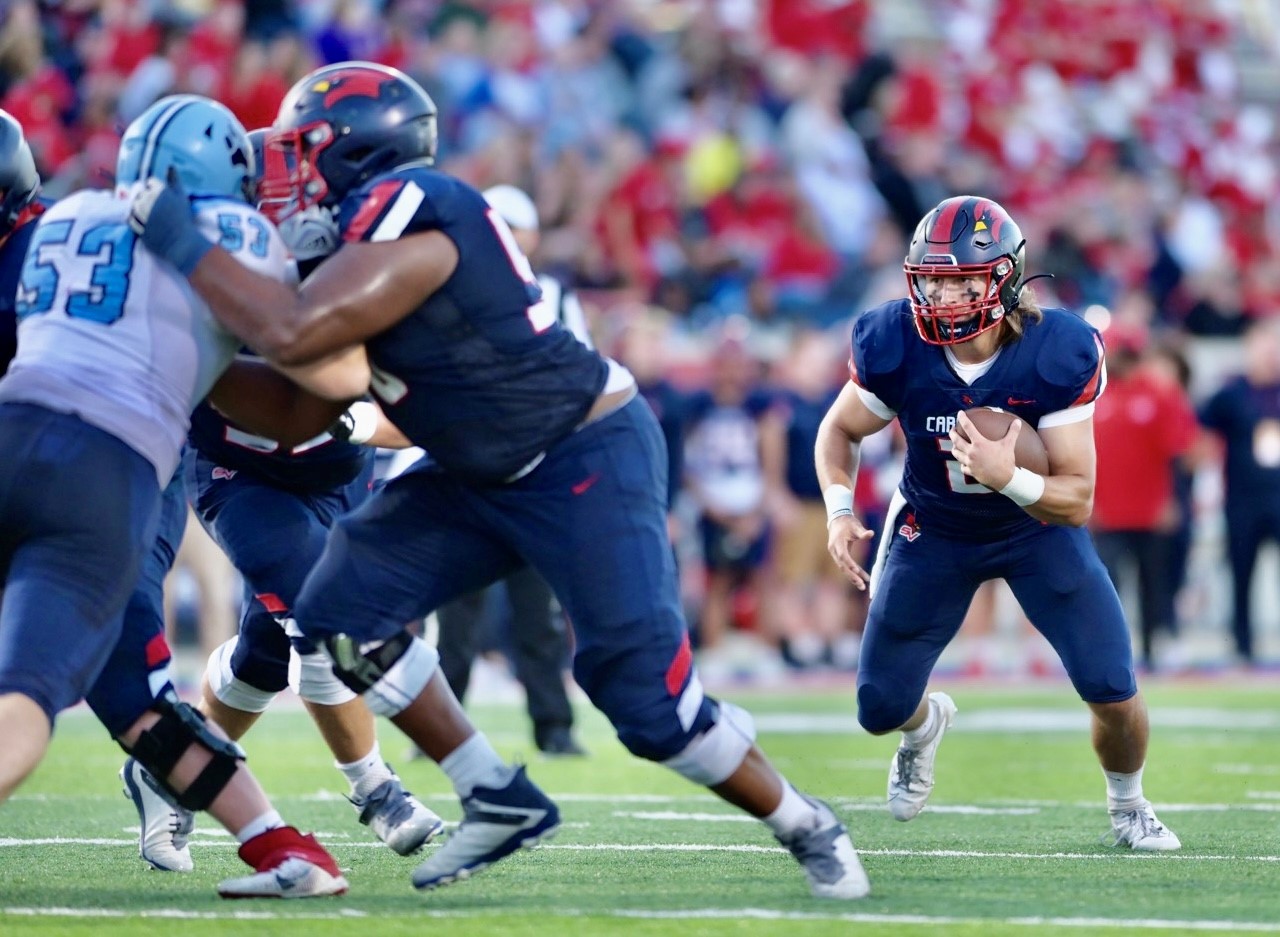 Cardinals Roll To Fifth-Straight Axe Bowl Victory