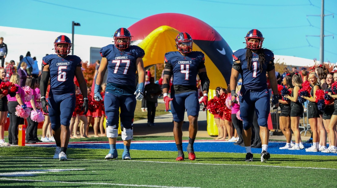 Cardinals Fall in Tight Battle on Homecoming