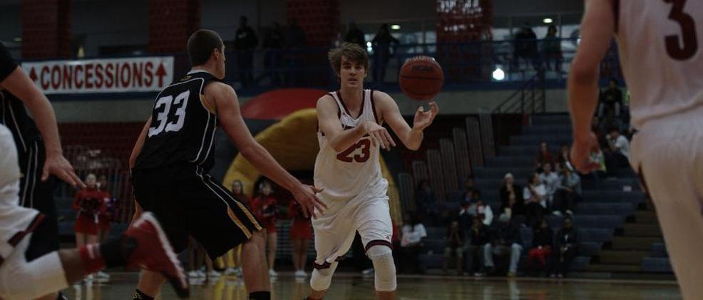 Cardinals Fall To Dragons, 65-52